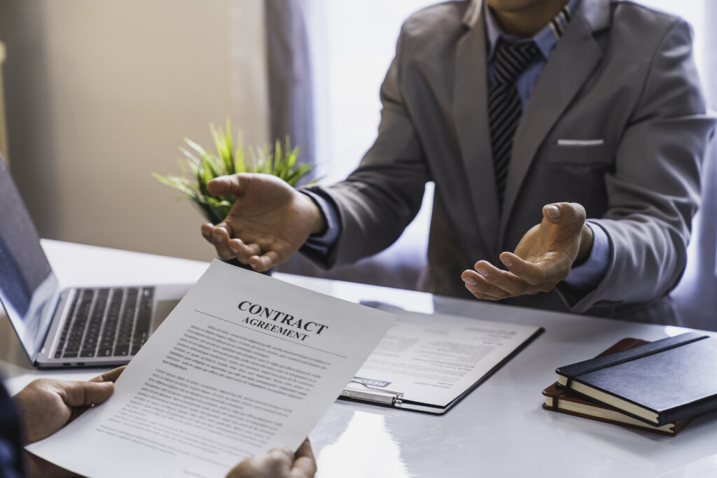 Lawyer reviewing a breach of contract