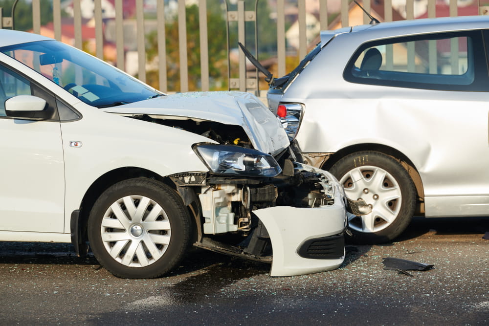 Rear-end collision damage between two vehicles illustrating a car accident claim in Melbourne Florida